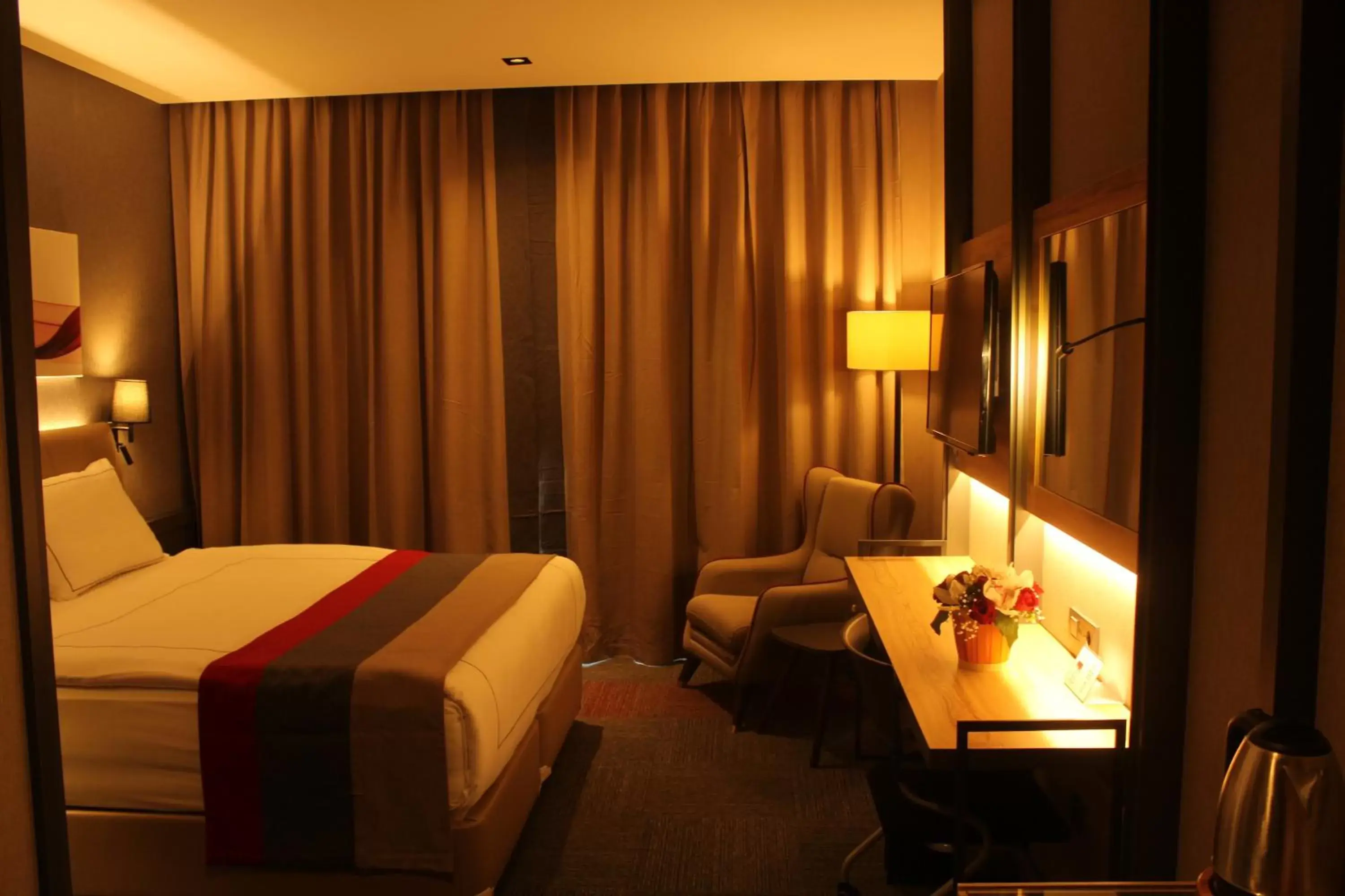 Photo of the whole room in Ramada By Wyndham Tire